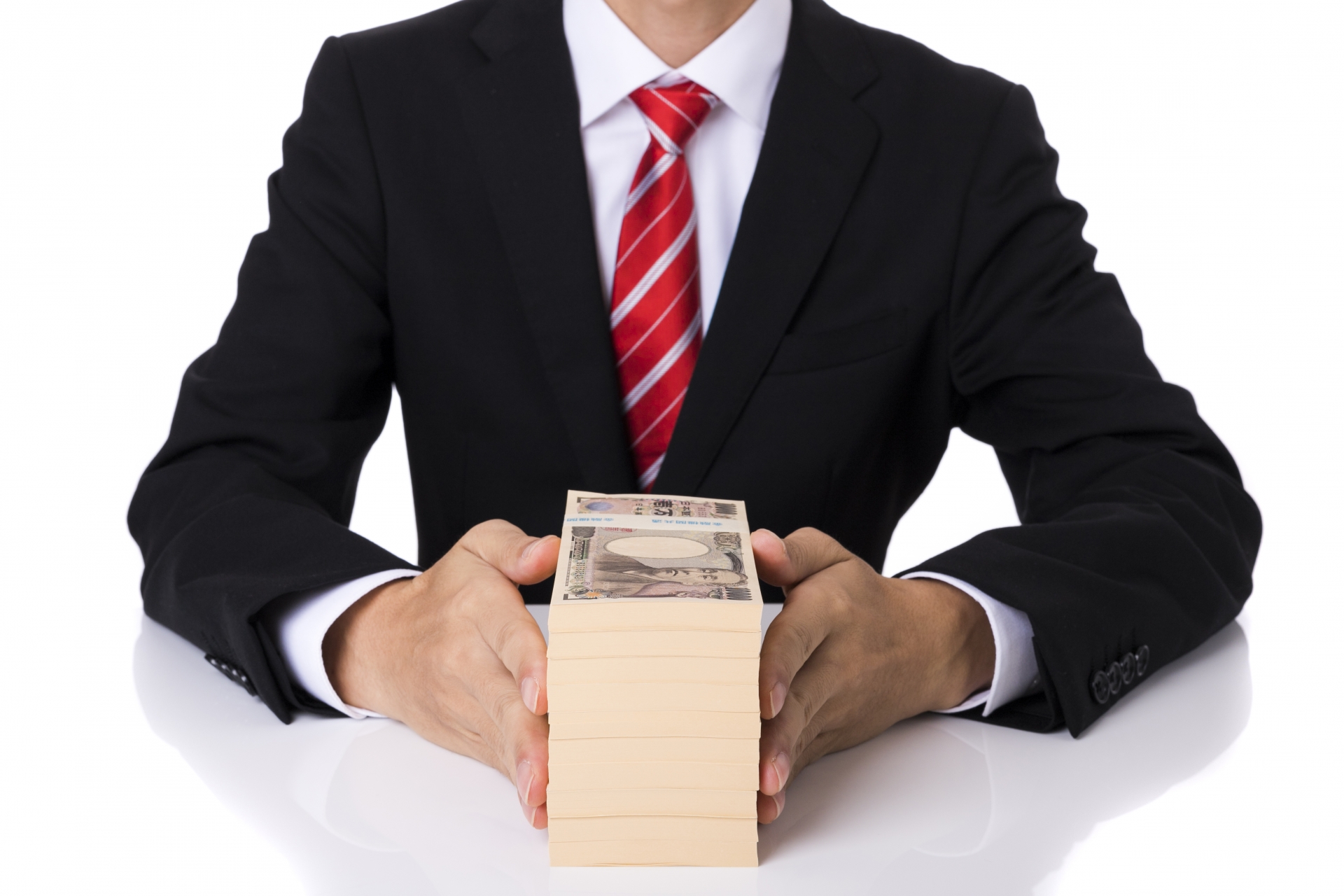 ビジネスマンと札束