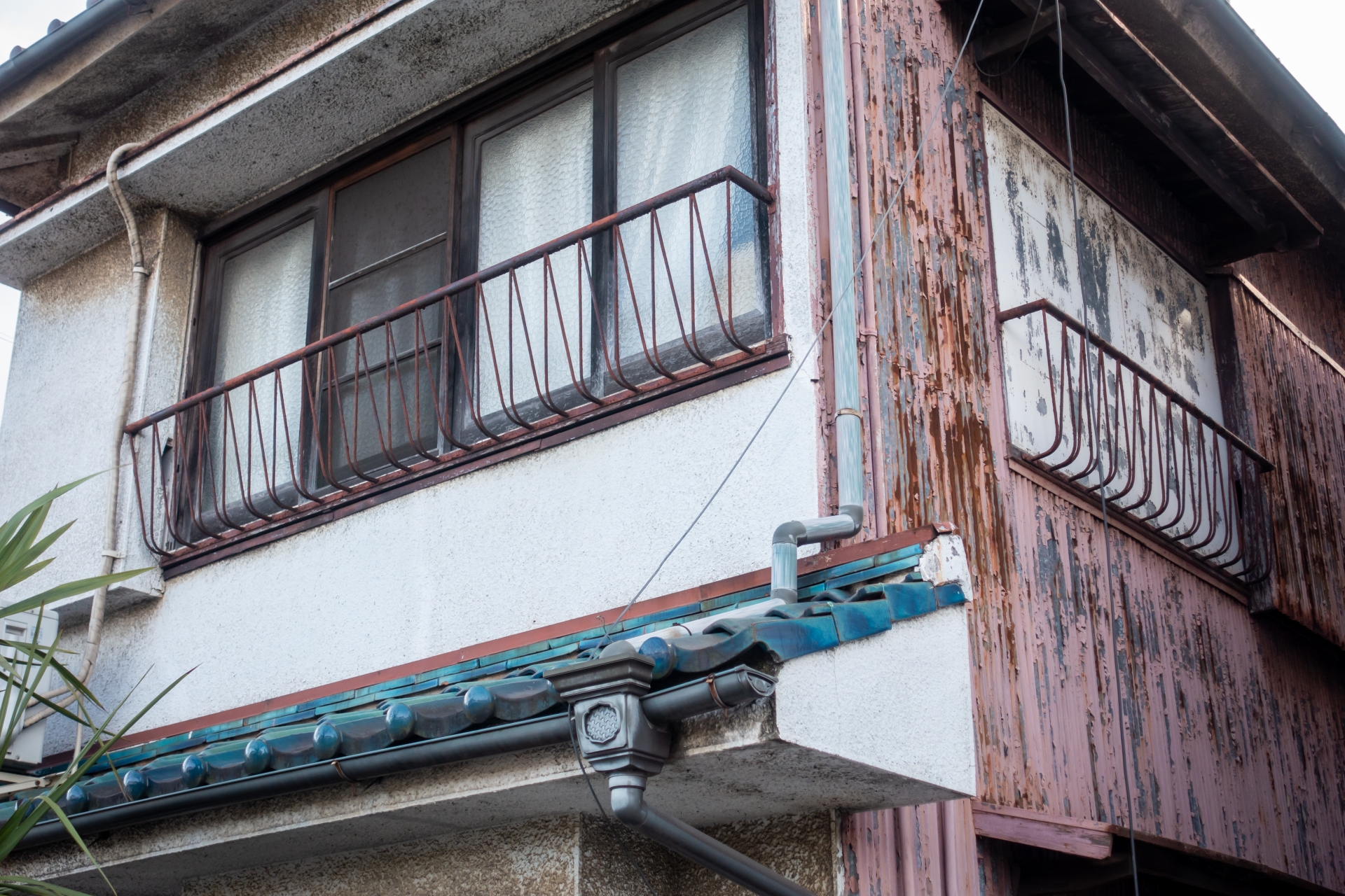古い住宅の写真。不動産のイメージ。