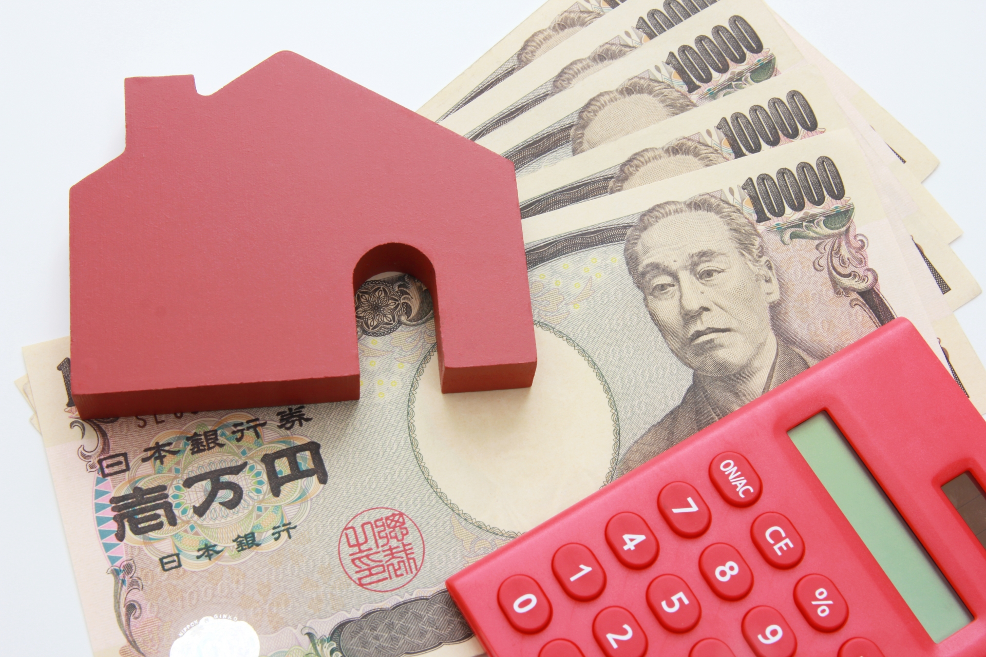 家の模型とお金